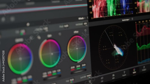 4k Video or photo grade using color wheels rings. Color grading correction process in software professional program. Monitor view of working process broadcast. Scopes and vetroscope can be seen