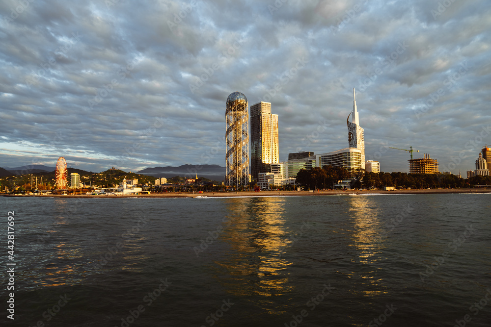 Batumi, Georgia skyline during sunset from the sea. Batumi, Georgia skyline during sunset from the sea.