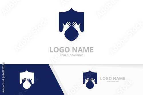 Vector shield and hands logo combination. Security embrace logotype design template.