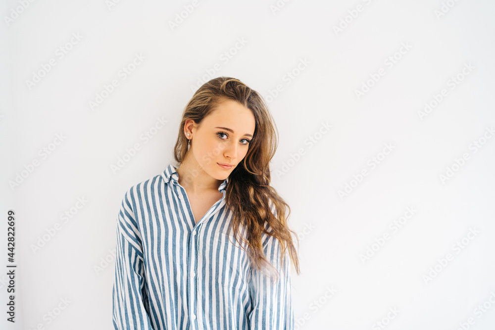 beautiful careless female with makeup looking at camera beautiful careless female with makeup looking at camera