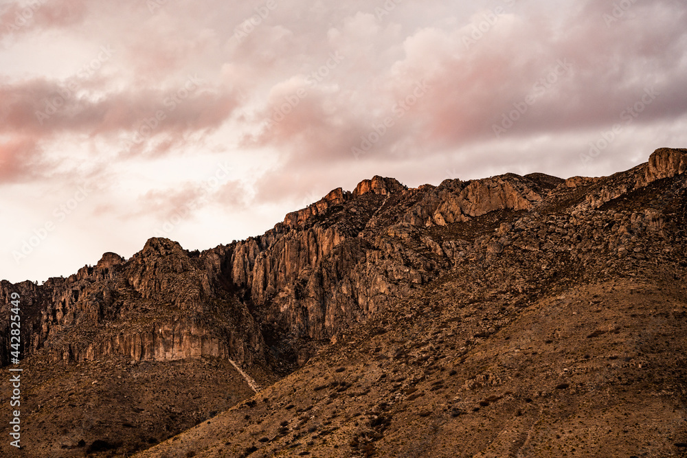 Pink Tinged Clouds At Sunset Over Hunter Peak