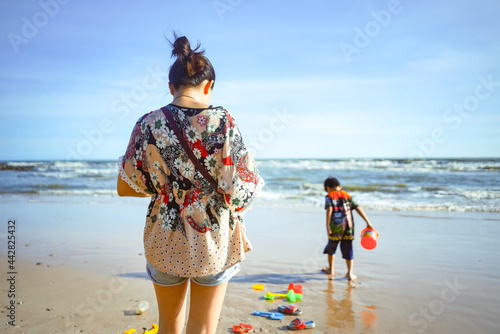 child playing on the beach