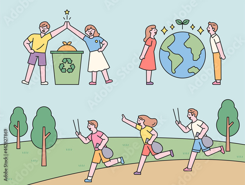 People collecting and high fives for recycling. People standing with the Earth in between. People jogging and picking up trash. flat design style minimal vector illustration.