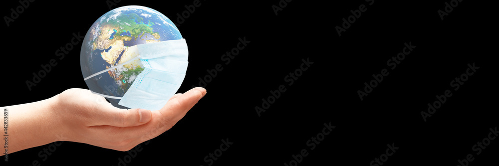 Planet earth is wearing a protective mask. 3d illustration Planet earth is wearing a protective mask. 3d illustration