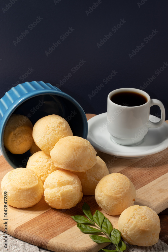 Brazilian cheese bread (pão de queijo) with black coffee. Brazilian cheese bread (pão de queijo) with black coffee.