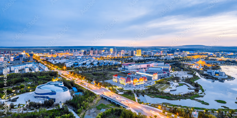 Naklejka premium Aerial photography of night view of Xilin River and city skyline in Xilinhot City, Xilin Gol League, Inner Mongolia