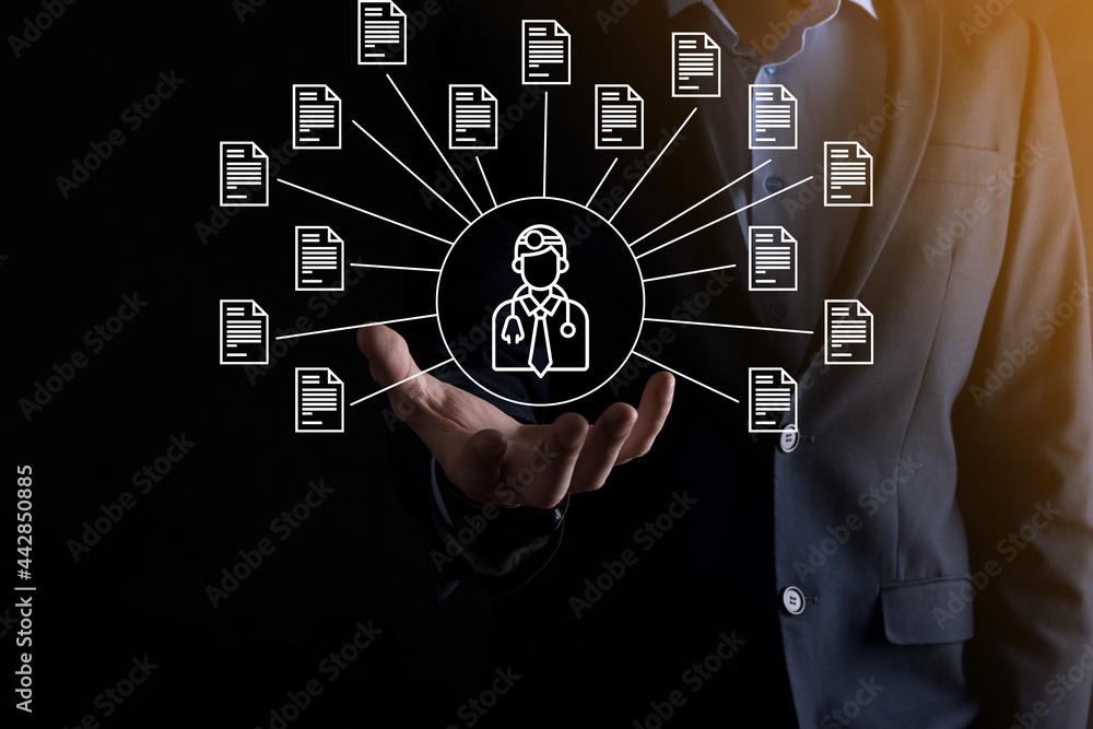 Document Management System DMS .Businessman hold doctor and document icon.Software for archiving, searching and managing corporate files and information.Internet Technology Concept.Digital security. Document Management System DMS .Businessman hold doctor and document icon.Software for archiving, searching and managing corporate files and information.Internet Technology Concept.Digital security.