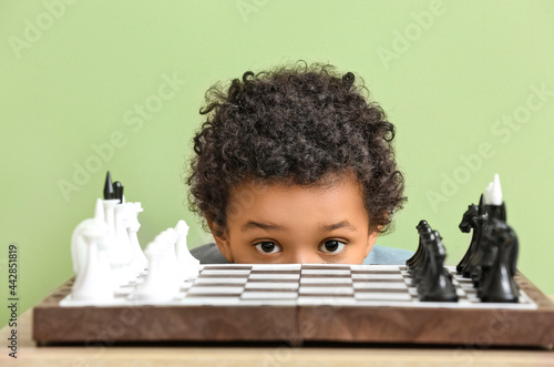 Cute African-American boy p...