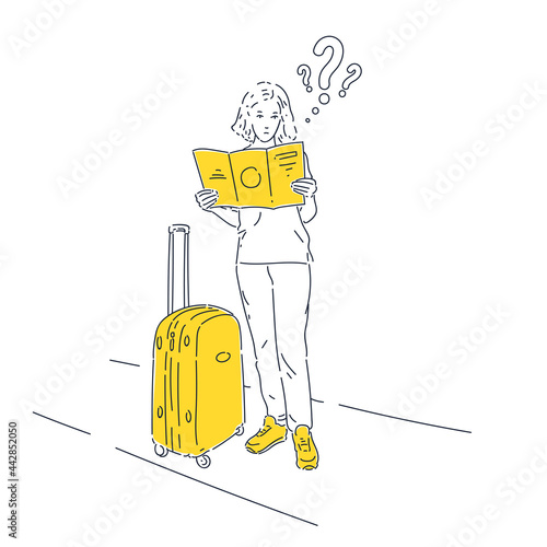 The girl is puzzled and tries to figure out the route. The girl is going to travel. A woman stands with a suitcase.