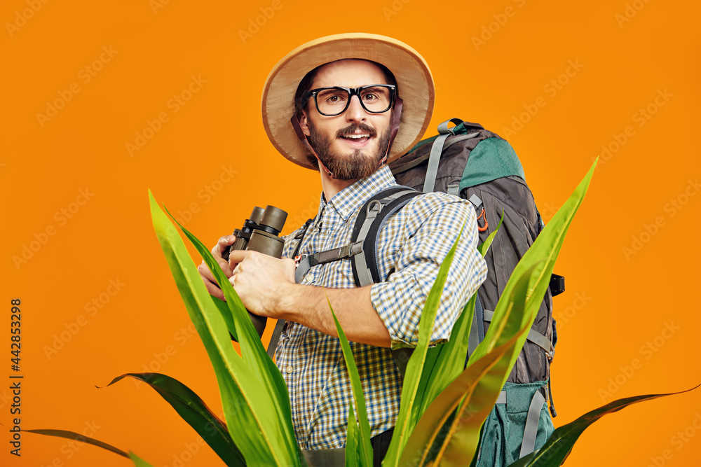 botanist with backpack - obrazy, fototapety, plakaty 