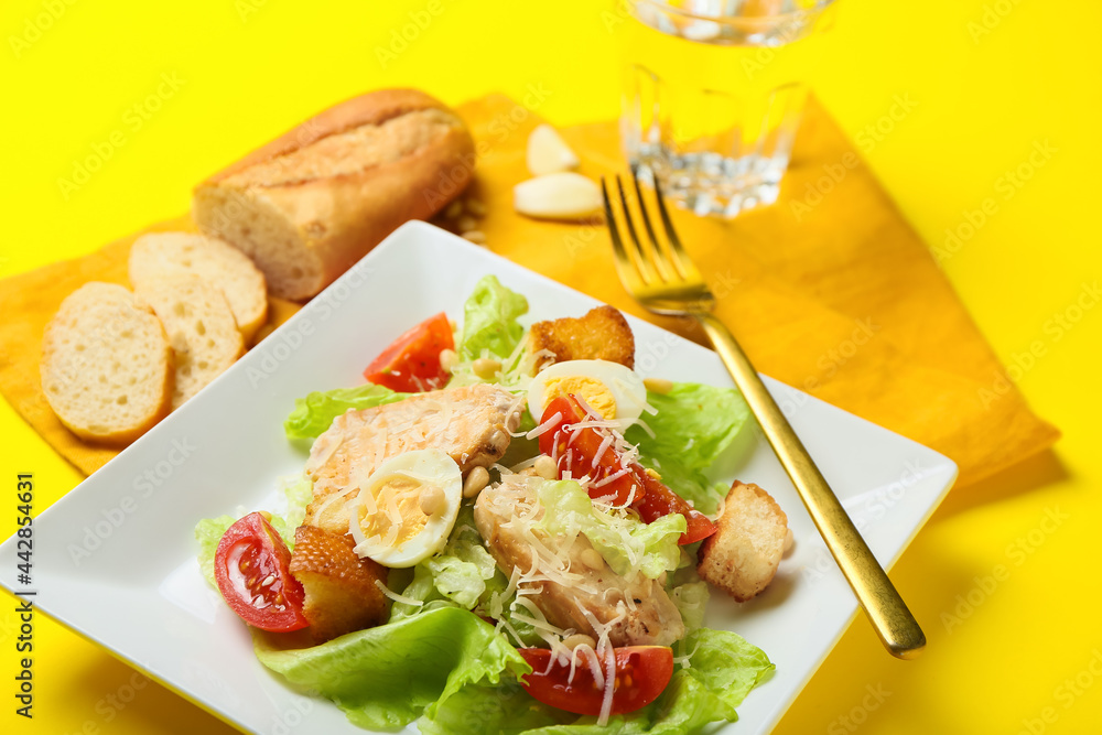 Plate with Caesar salad on color background, closeup Plate with Caesar salad on color background, closeup