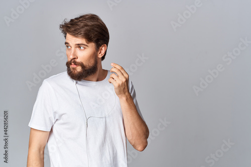 bearded man in white t-shirt emotions fun studio