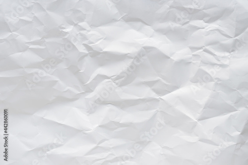 White crumpled paper texture background.