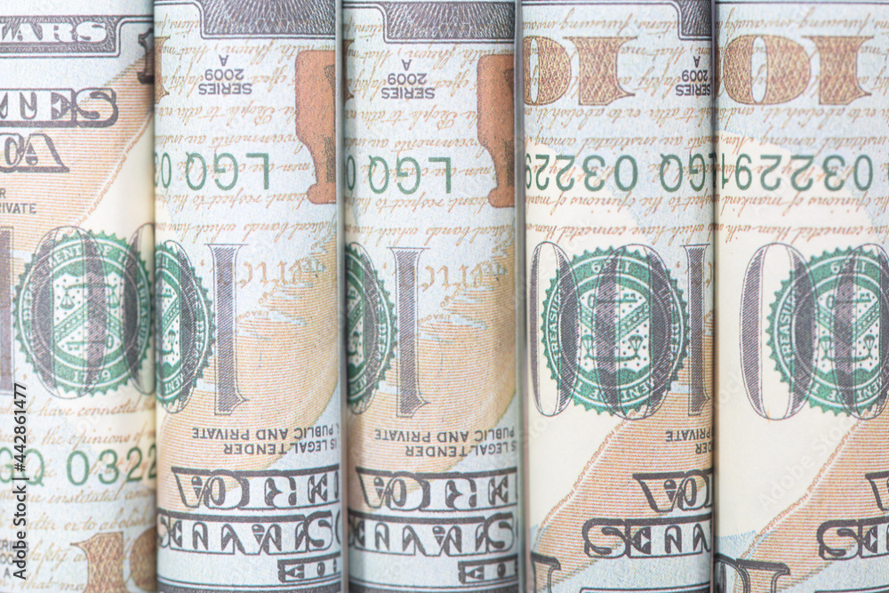Rolled dollar banknotes background Rolled dollar banknotes background