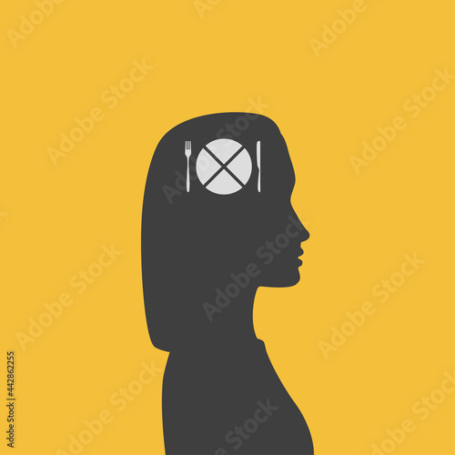 Silhouette profile of woman with crossed out plate in her head - metaphor of eating disorders. Poster of anorexia nervosa  bulimia and other eating disorders.