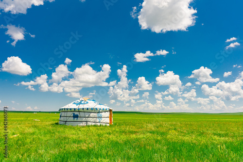 The traditional Mongolian tents on the Hulunbuir grassland in Inner Mongolia, China.