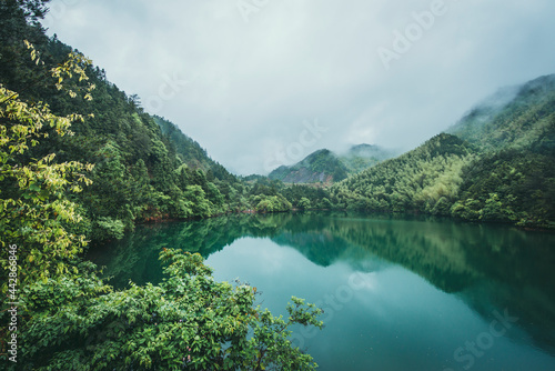 Lake in misty mountains