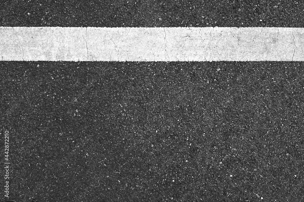 Fototapeta premium Surface grunge rough of asphalt, Seamless tarmac dark grey with white line on the road and small rock, Texture Background, Top view