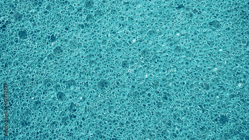 Blue washing sponge, Surface with porous texture for background, Close up