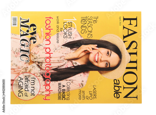 Modern printed fashion magazine isolated on white, top view