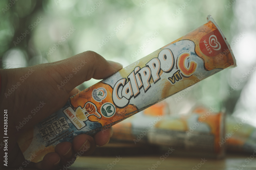 Samut Prakan, Thailand - July 2, 2021 : Hand holding with Calippo ice ...