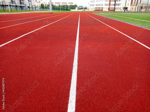 Running track at the stadium. Sports, sports competitions, football stadium, school