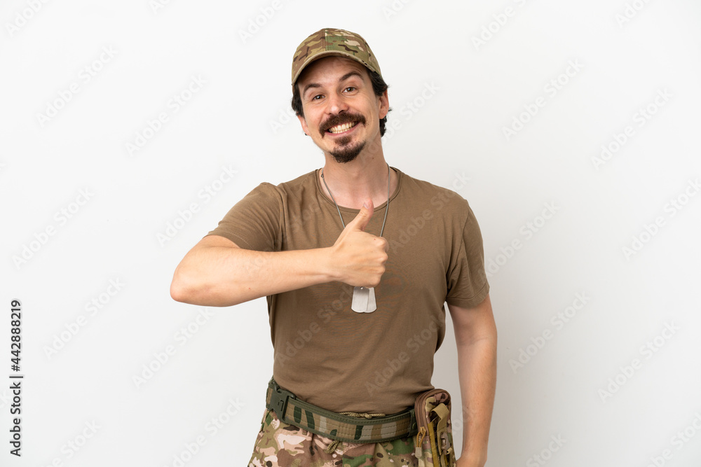 Soldier man isolated on white background giving a thumbs up gesture Soldier man isolated on white background giving a thumbs up gesture