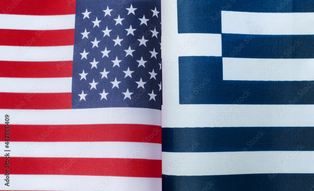 Fototapeta premium fragments of the national flags of the United States and Greece in close-up
