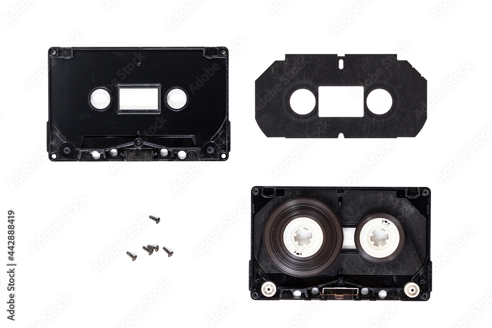 compact audio cassette detail part disassembled state isolated. Inside view compact audio cassette black plactic body.