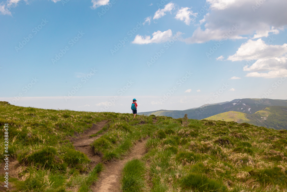 trekking in the mountains with a child