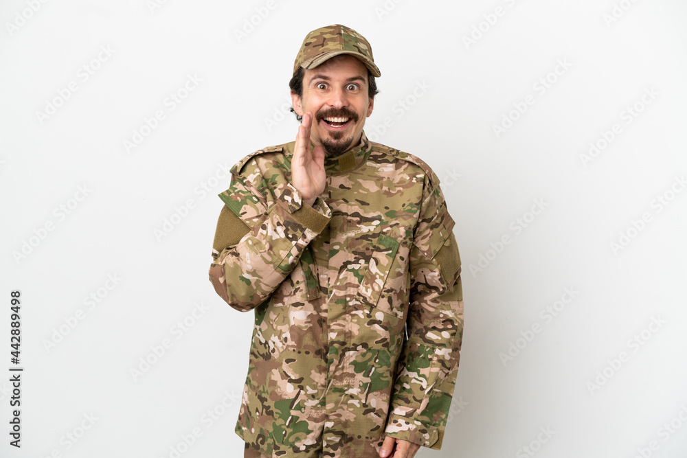 Soldier man isolated on white background with surprise and shocked facial expression