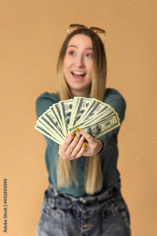 woman holds cash money in dollar banknotes woman holds cash money in dollar banknotes