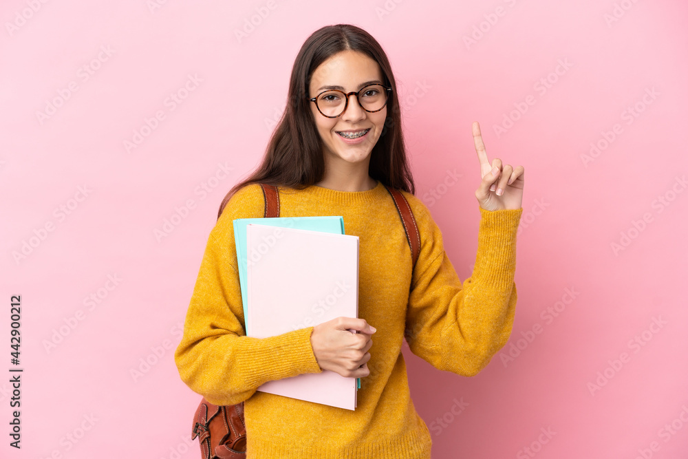 Young student woman over isolated background pointing up a great idea Young student woman over isolated background pointing up a great idea