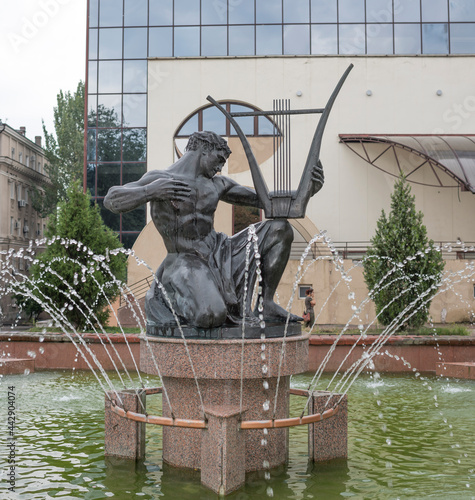 Photography Orpheus sculpture in the fountain near the theater Philharmonic