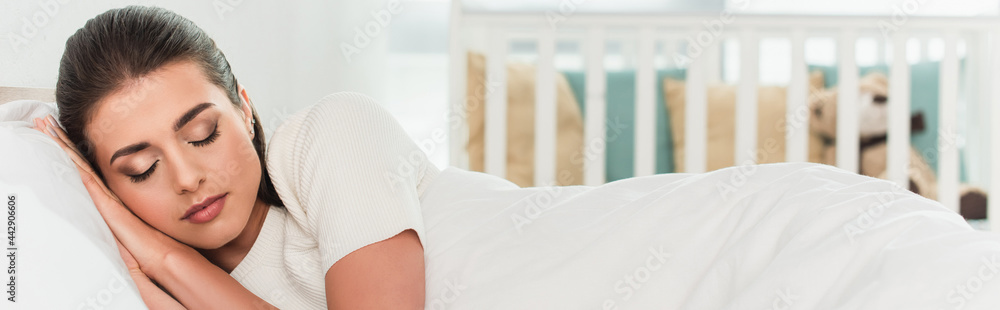 Young woman sleeping on bed at home, banner Young woman sleeping on bed at home, banner