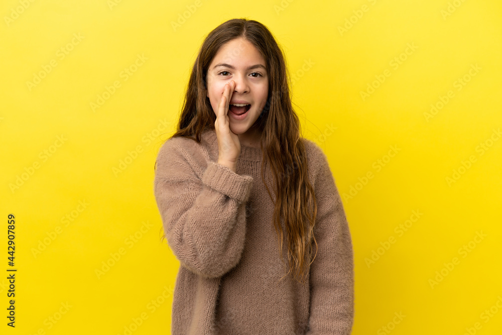 Little caucasian girl isolated on yellow background shouting with mouth wide open Little caucasian girl isolated on yellow background shouting with mouth wide open