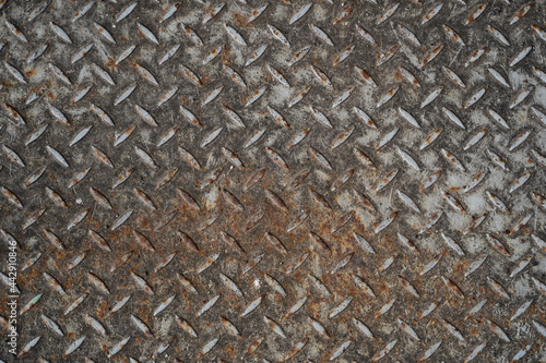 Texture of rusty metal plate of the floor.
