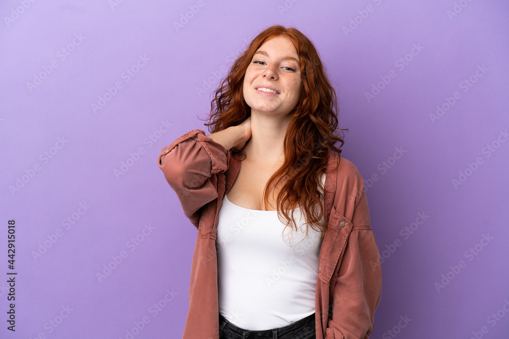 Teenager redhead girl over isolated purple background laughing Teenager redhead girl over isolated purple background laughing