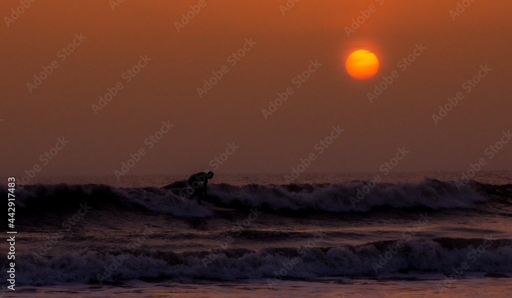Surfer at Dusk Surfer at Dusk