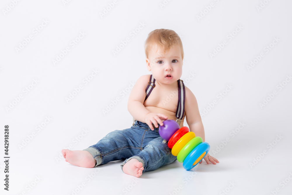 toddler baby boy with toy on white background toddler baby boy with toy on white background