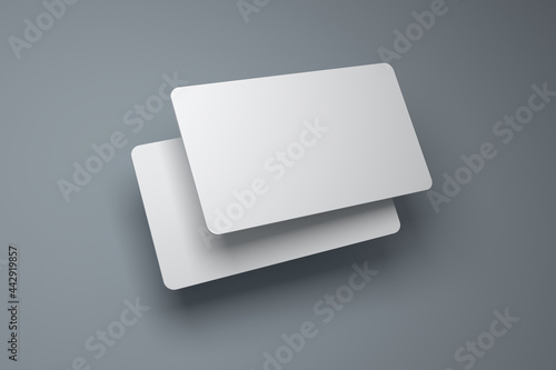 Realistic rounded corners floating business branding cards mockup with shadows for graphic design template. Blank credit card mockup front and back over a pastel background. 3D rendering