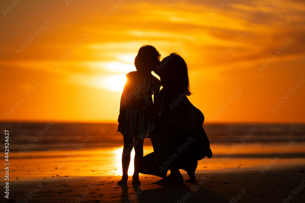 Mother and Daughter, Sunset Silhouette Mother and Daughter, Sunset Silhouette