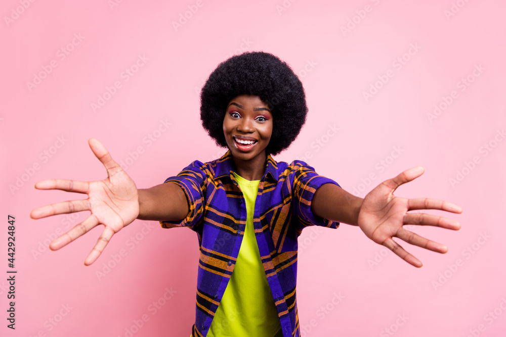 Portrait of attractive funky kind cheerful girl hugging you come here isolated over pink pastel color background Portrait of attractive funky kind cheerful girl hugging you come here isolated over pink pastel color background
