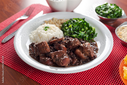 Принти на полотні Traditional Brazilian feijoada food. Full table to serve