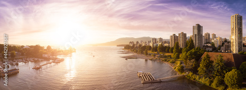 Aerial Panoramic View of Modern City with a beach on the West Coast Pacific Ocean. Sunny Summer Sunset Sky Art Render. False Creek, Downtown Vancouver, British Columbia, Canada.