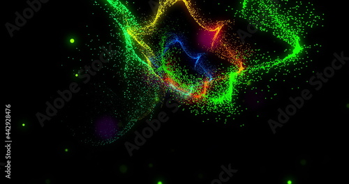 Blue red yellow and green trails of glowing dripping light rotating on black background