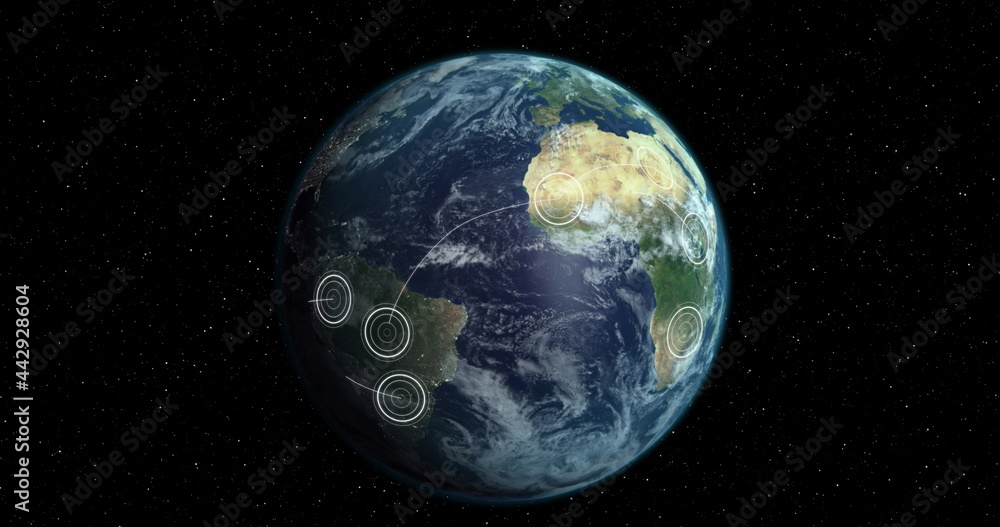 Fototapeta premium Turning globe with radiating white concentric circles spreading between territories on black backgro