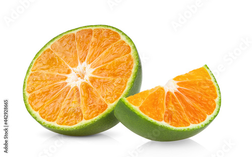 green orange tangerine slice on white background