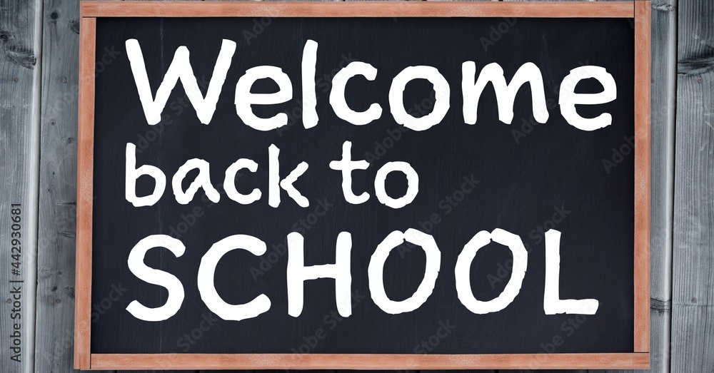 Composition of back to school text over black chalkboard