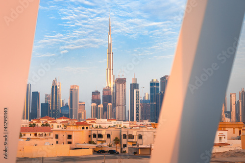 Photography Suburb of Dubai with private residential buildings against the backdrop of a dow